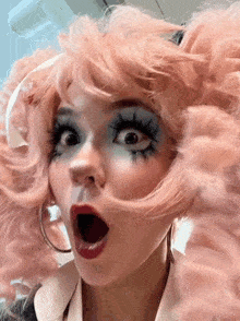 a woman with a surprised look on her face