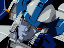 a close up of a robot 's face with a blue and white helmet
