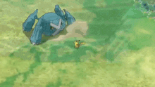 a pikachu is laying on the ground next to a large blue robot