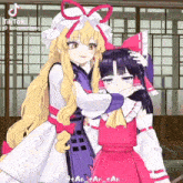 two anime girls are hugging each other with tik tok written on the bottom