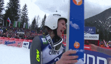 a person wearing a helmet that says uvex