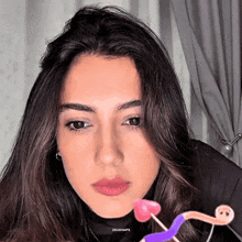 a close up of a woman 's face with the watermark zeudgifs on the bottom right