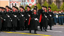 a group of soldiers marching in a parade with a band playing in the background