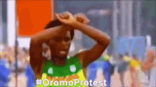 Feyisa Lilesa Olympic Athlete GIF - Feyisa Lilesa Olympic Athlete Oromo GIFs