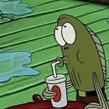 a cartoon character from spongebob squarepants is drinking a soda through a straw .