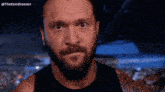 a man with a beard is looking at the camera with the hashtag @thekamdreesen on the bottom