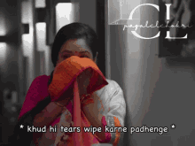 a woman covering her face with a cloth with the words khud hi tears wipe karne padhenge