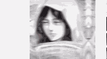 a black and white drawing of a woman 's face with a hood on .