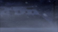 a close up of a person 's face in the fog with a pyramid in the background .