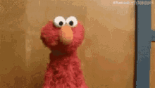 Elmo Shrug GIF
