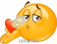 a cartoon smiley face is blowing a kiss with a heart in its mouth .