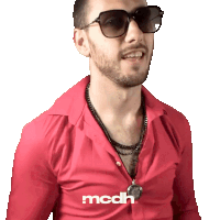 a man wearing sunglasses and a red shirt says mcdh