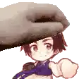 a hand is putting a hat on a cartoon character .