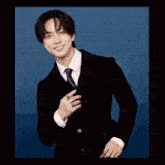 a man in a suit and tie is dancing in a hallway