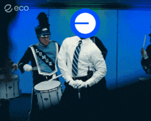 a man in a marching band has a blue circle on his head