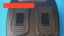 a black device that looks like a cell phone with the word renf on the bottom