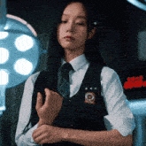a girl in a school uniform has a patch on her chest that says ' seoul '