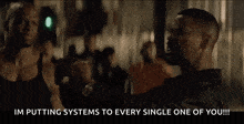 a man in a black jacket says im putting systems to every single one of you !!!