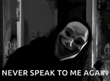 a person wearing a mask with the words never speak to me again