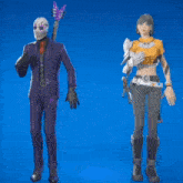 a man in a purple suit and a woman in a yellow shirt are holding a heart in their hands