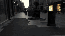 a blurry picture of a person laying on the ground in front of a store with a yellow sign