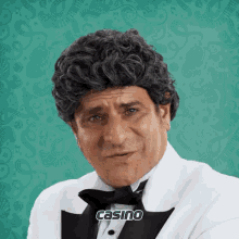 a man in a tuxedo with the word casino on the bottom right corner