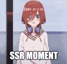 a girl with red hair and headphones is standing next to a pole with the words `` ssr moment '' written on it .
