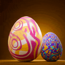 two colorful easter eggs on a brown background