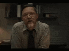 a man is standing in a doorway and saying i have a job for you .
