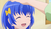 a blue haired girl with a yellow bow on her head