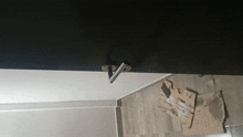 a black door with a silver handle is open