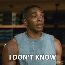 a man in a grey tank top says " i don t know "