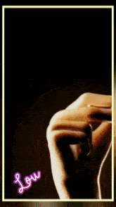 a picture of a woman 's hand with the word love written on it