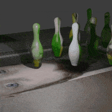 a bunch of bowling pins are on a table