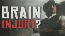 a man in a cowboy hat is holding a gun in front of a sign that says brain injury ?