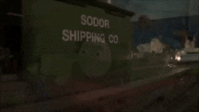 a green building that says sodor shipping company on it