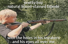 a man holding a gun with the words " pretty boy natural blood-stained blonde " on the bottom