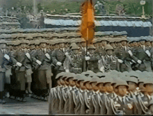 a large group of soldiers marching in a line