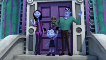 a family standing in front of a purple door