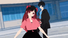 a girl with red hair is standing next to a boy in a suit