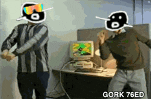 two men are dancing in front of a computer with gork 76ed on the bottom