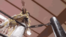 a person in a wrestling ring with a belt that says p on it