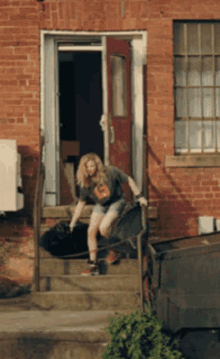The Peripheral Chloe Grace Moretz GIF - The Peripheral Chloe Grace Moretz Taking Out The Trash GIFs