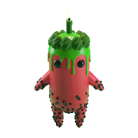 a figurine of a watermelon with a green frosting and a candle on top
