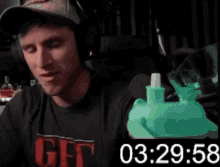 a man wearing headphones and a shirt that says ' don 't get '