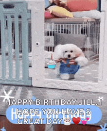 a small white dog is standing in a cage holding a cupcake and a candle .