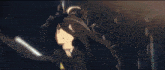 a dark background with a glowing object in the center