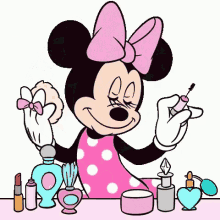 Minnie Mouse Spray GIF - Minnie Mouse Spray Perfume GIFs