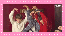 a group of people are dancing in front of a pink background that says imp