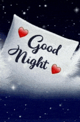 a white pillow with the words good night written on it .